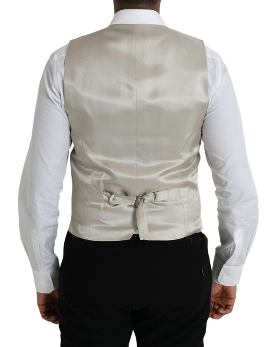 A light gray wool vest with a bow tie, part of a formal dress ensemble