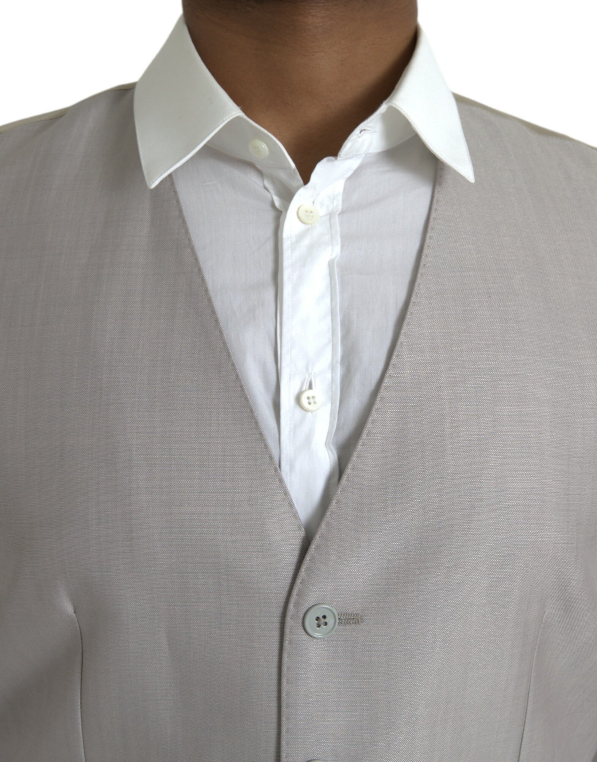 A light gray wool vest with a button-up front and two pockets