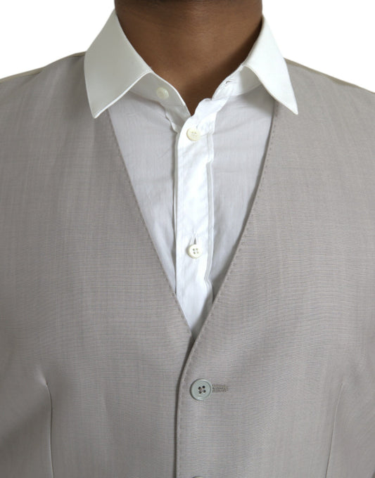 A light gray wool vest with a button-up front and two pockets