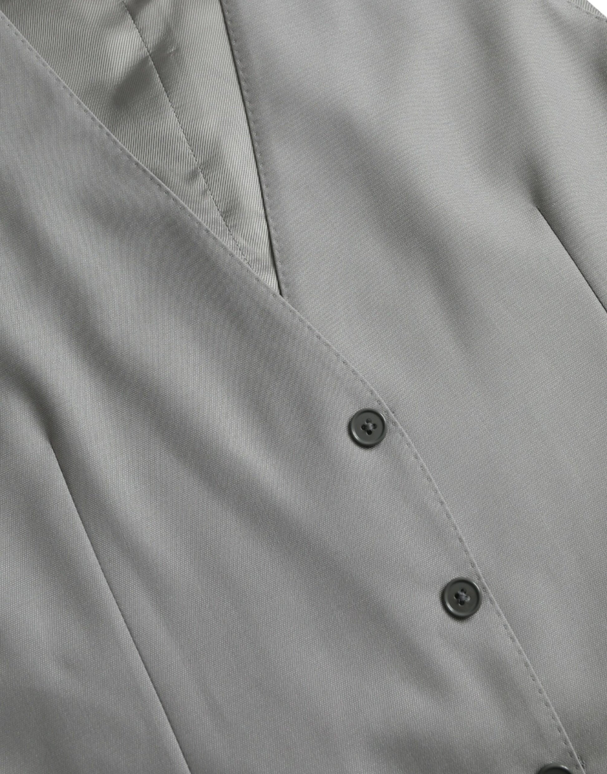 A gray vest with a button front and lapel collar, part of a formal dress ensemble