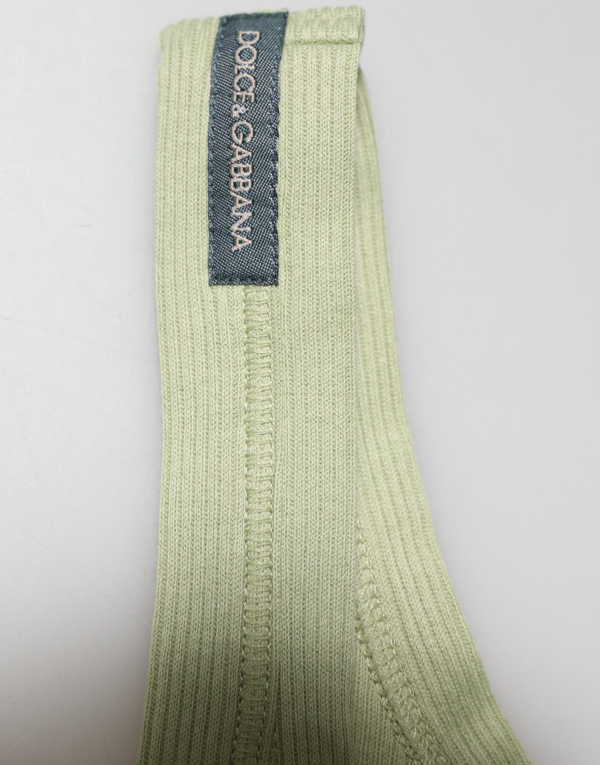 Green tie with label