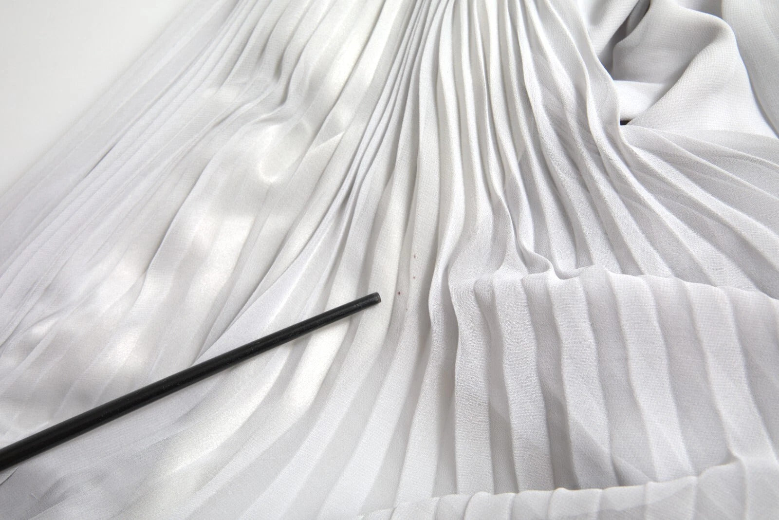 A light grey pleated maxi dress by Dolce & Gabbana, made of polyester