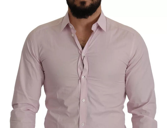 A light pink cotton dress shirt with a gold button and collar