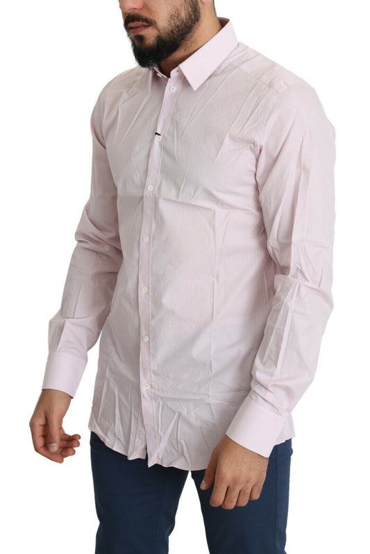 A light pink cotton formal dress shirt with long sleeves and a collar