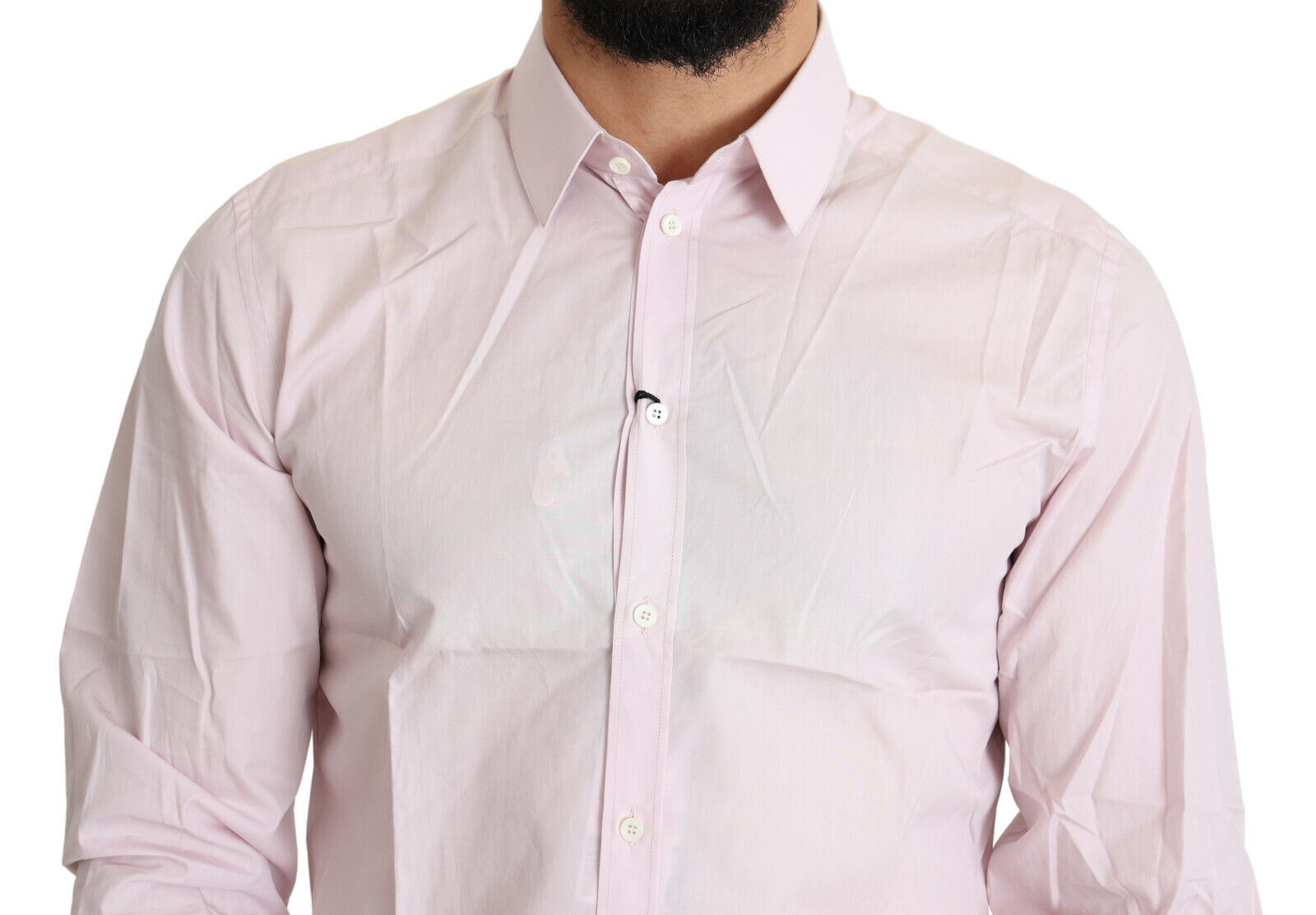 A light pink cotton dress shirt with a gold button-up front