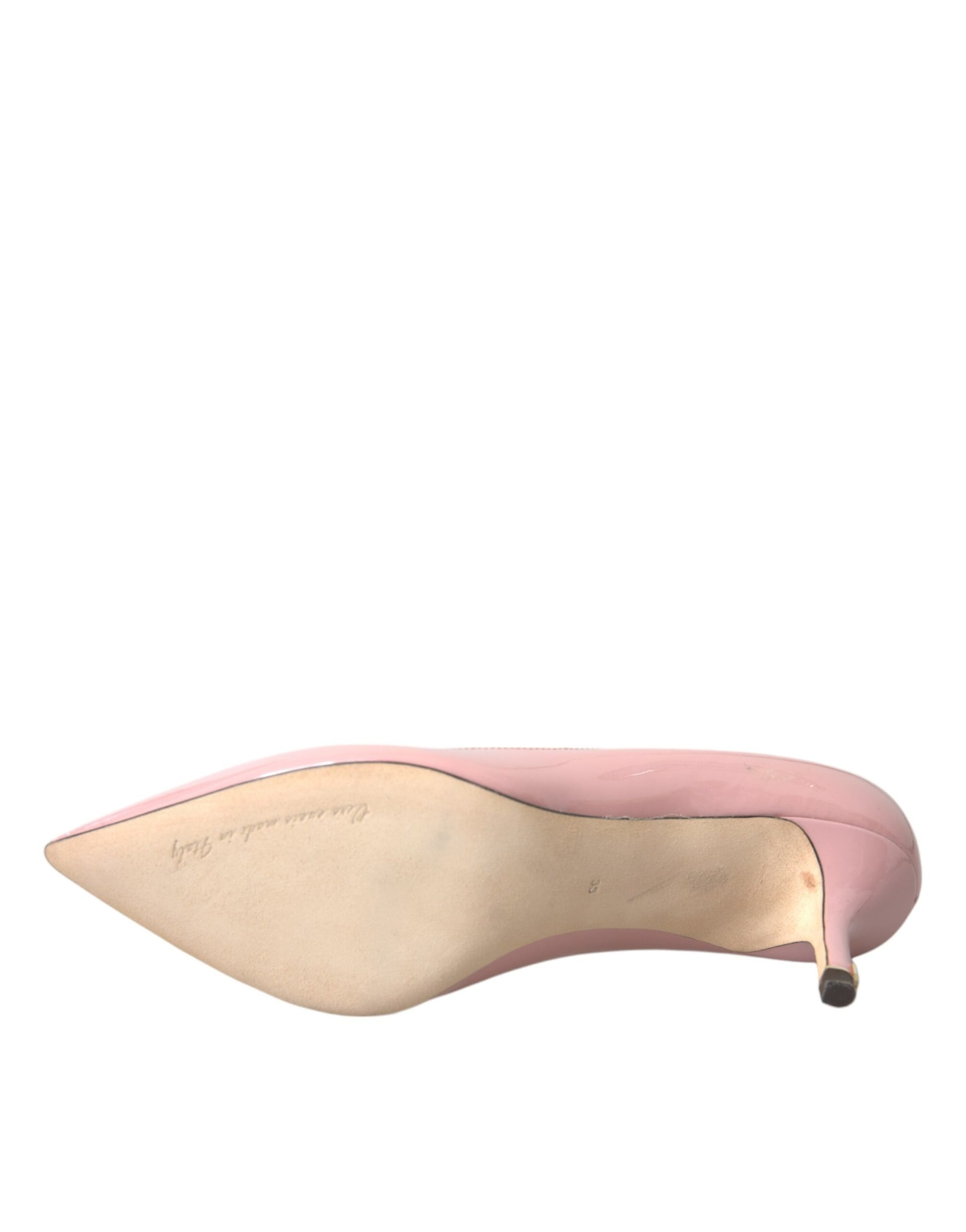 Pink high heel shoe with a pointed toe and stiletto heel