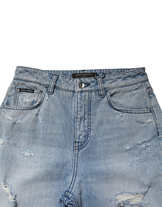Blue denim jeans with distressed details