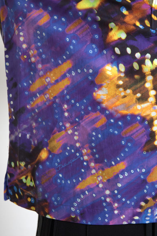 Vibrant tie dye shirt with blue, purple, orange and yellow hues