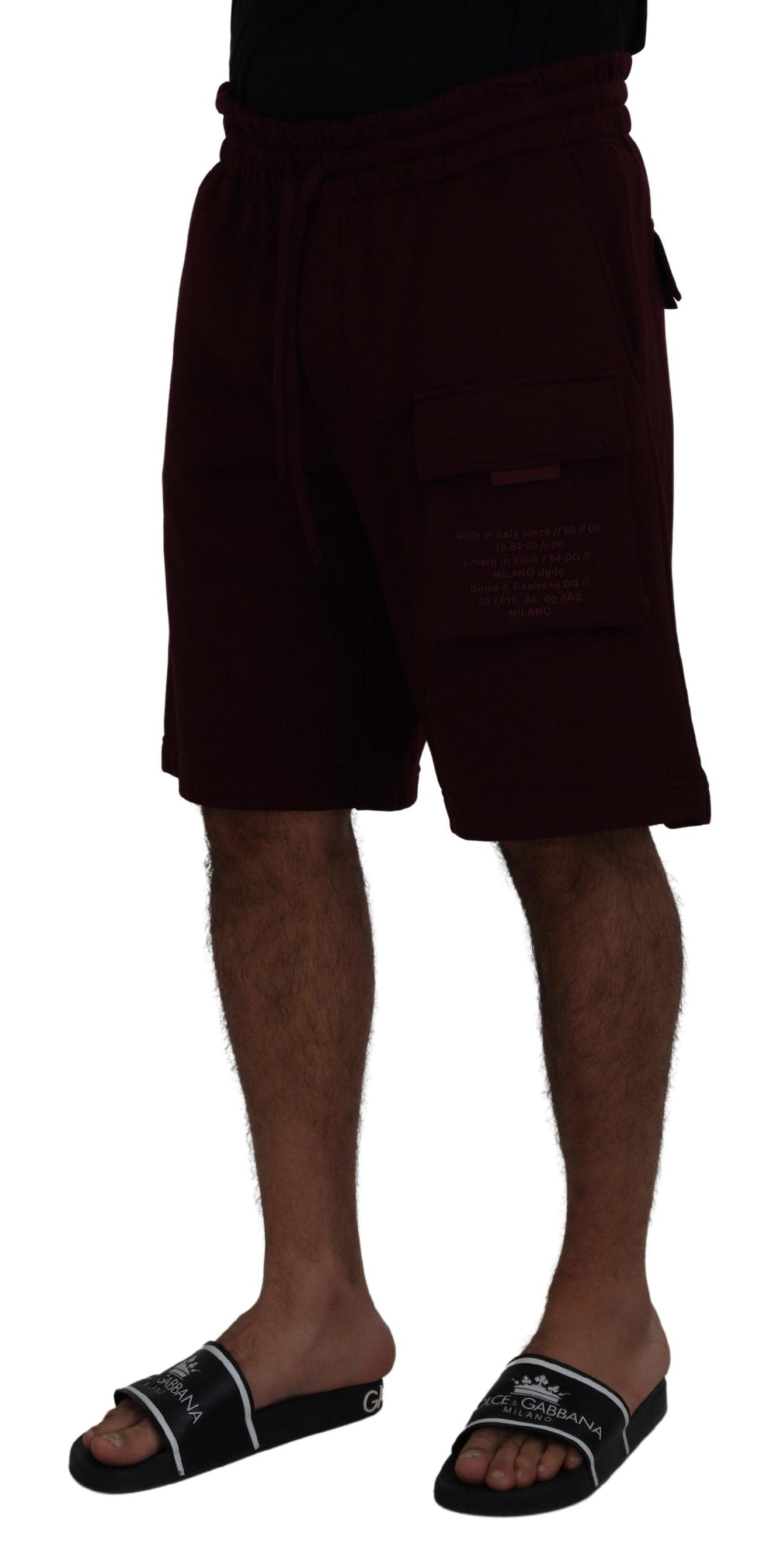 Pair of black flip flops worn by a man