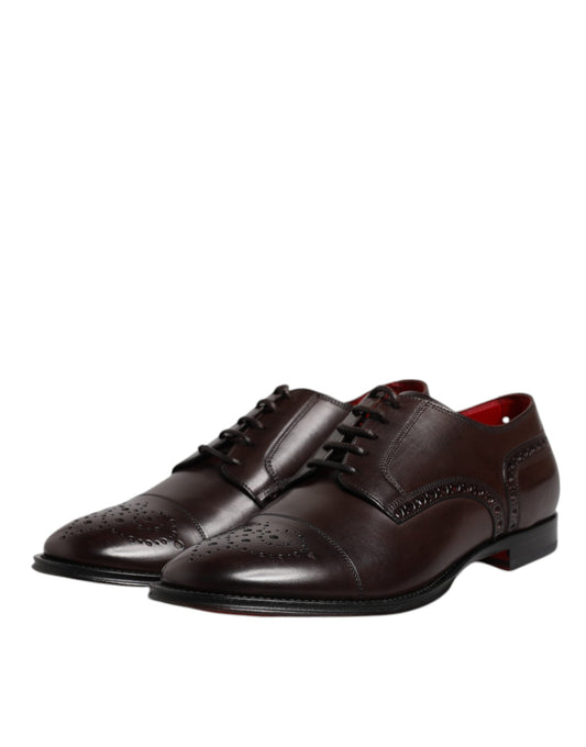 Pair of men's dress shoes with laces, featuring a maroon calfskin leather upper and a red sole