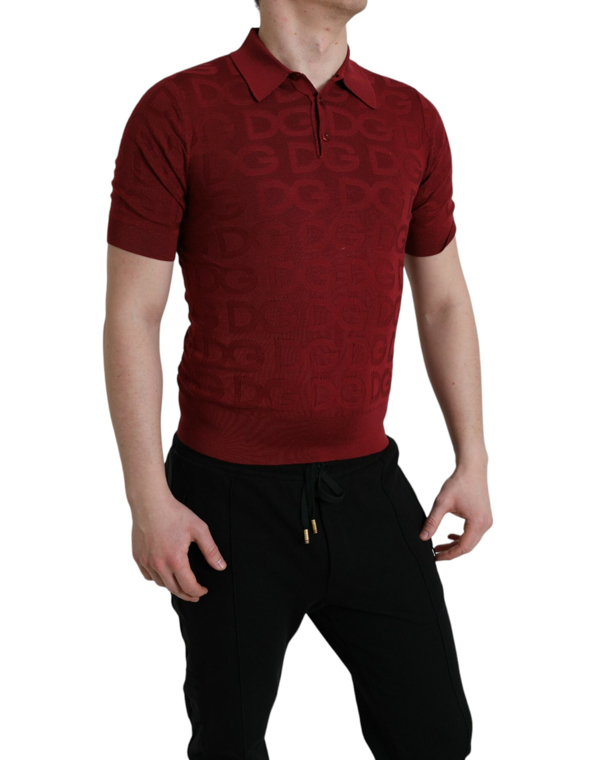 Man wearing red polo shirt and black pants