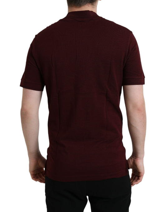 The back view of a maroon short sleeve t-shirt on a mannequin
