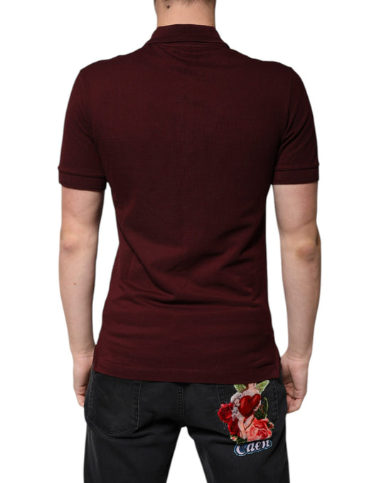 Man wearing polo shirt and jeans with floral design on back