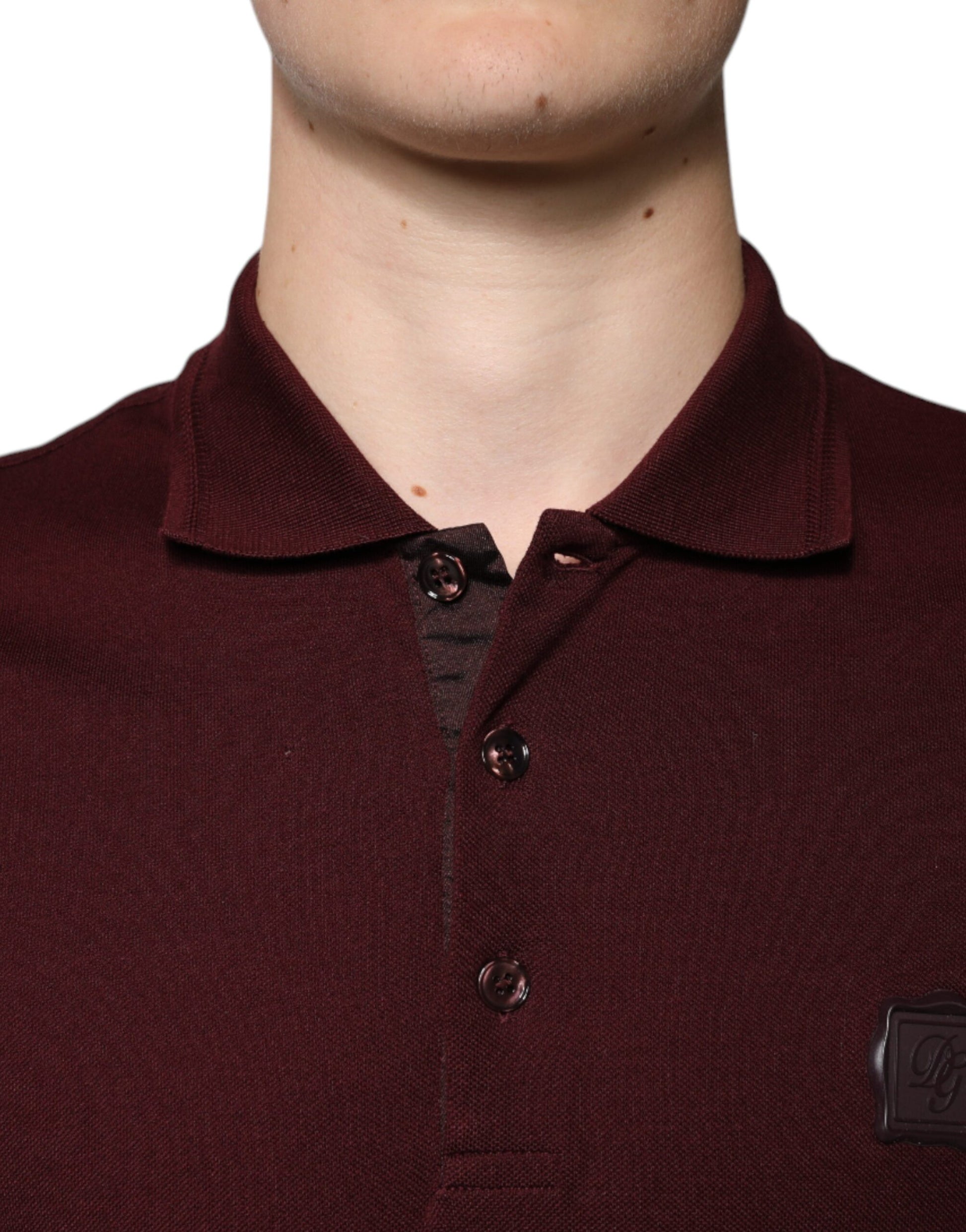 Man wearing a maroon polo shirt