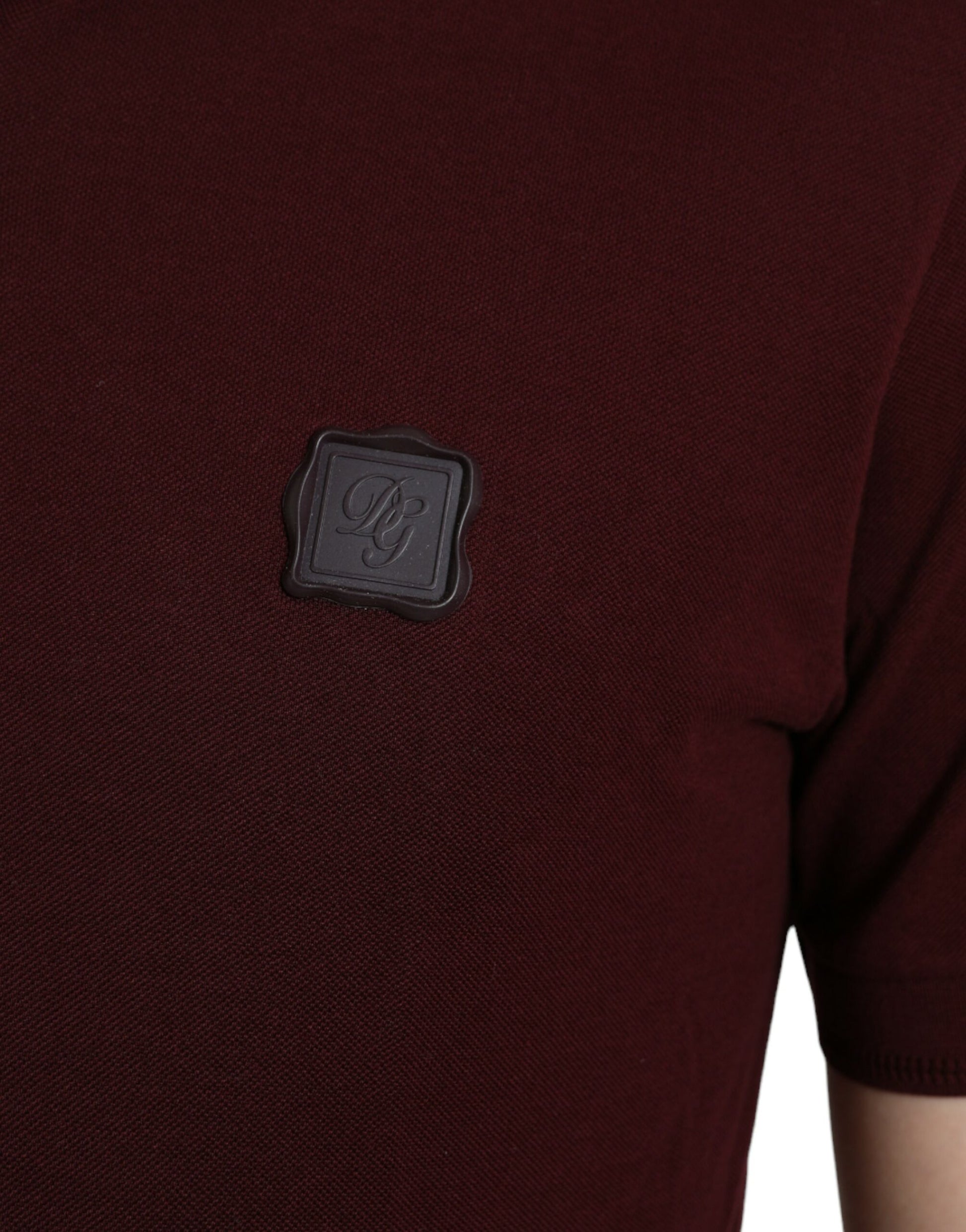 Tag on burgundy sweater