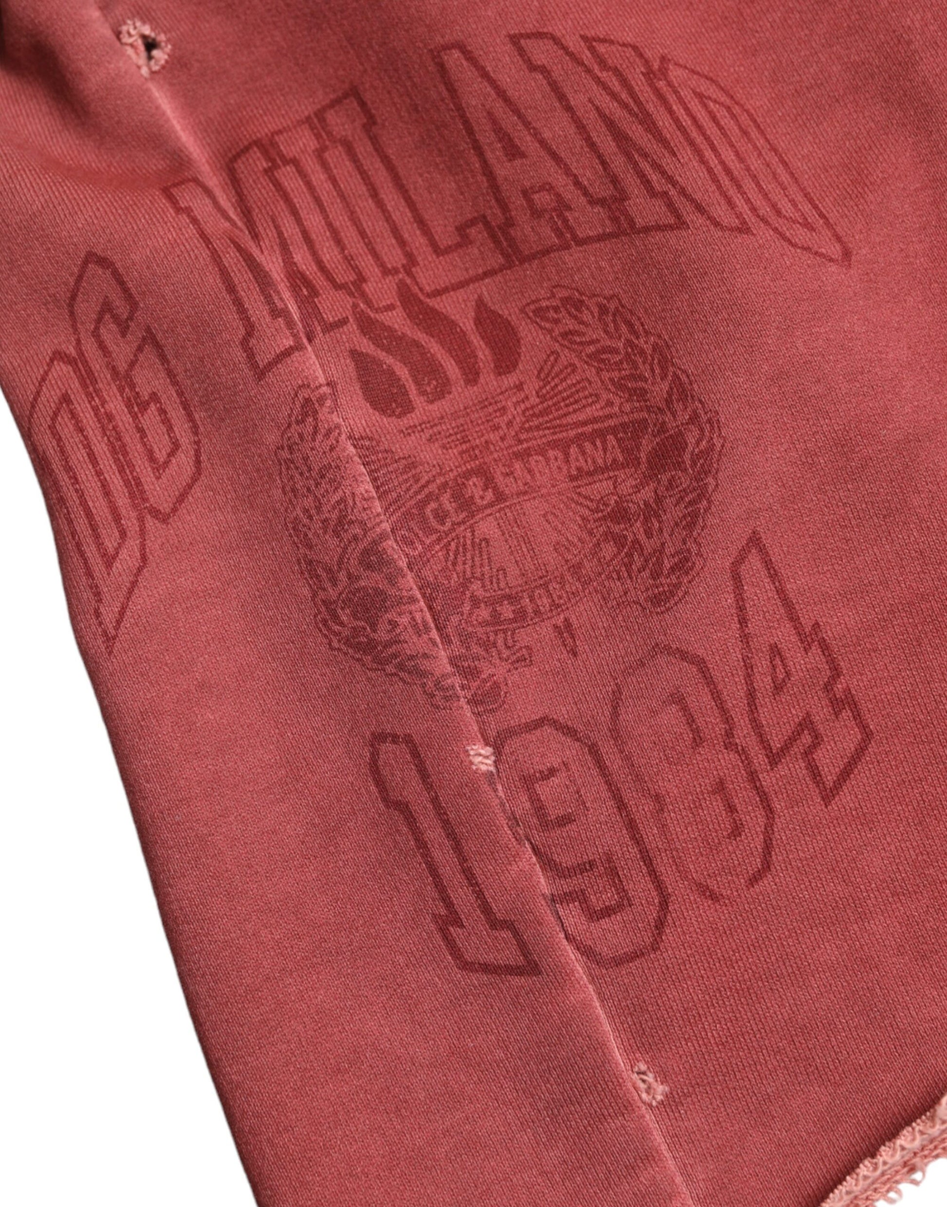 Red cloth with embroidered lettering