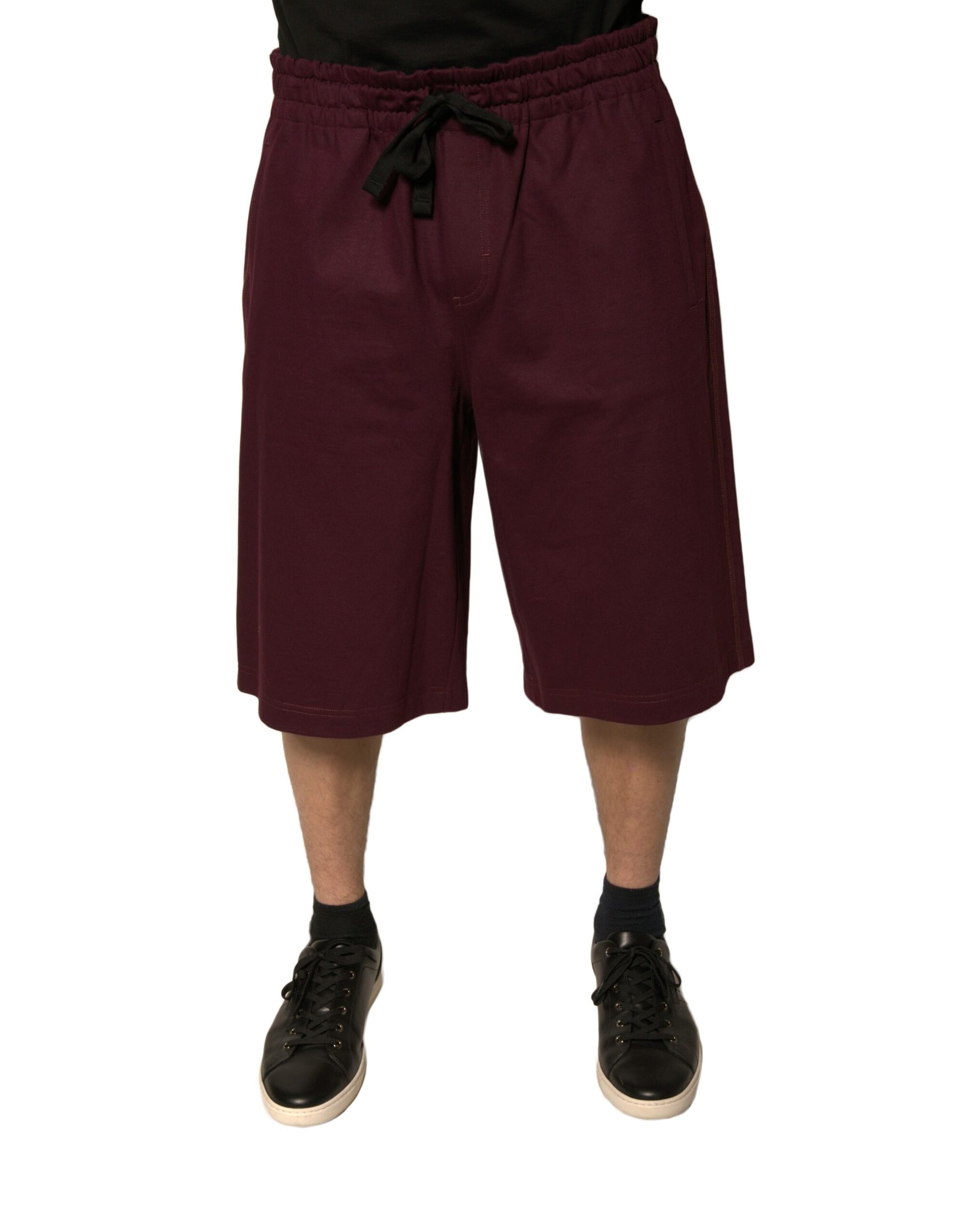 A pair of maroon cotton mid waist bermuda shorts from the brand Dolce & Gabbana