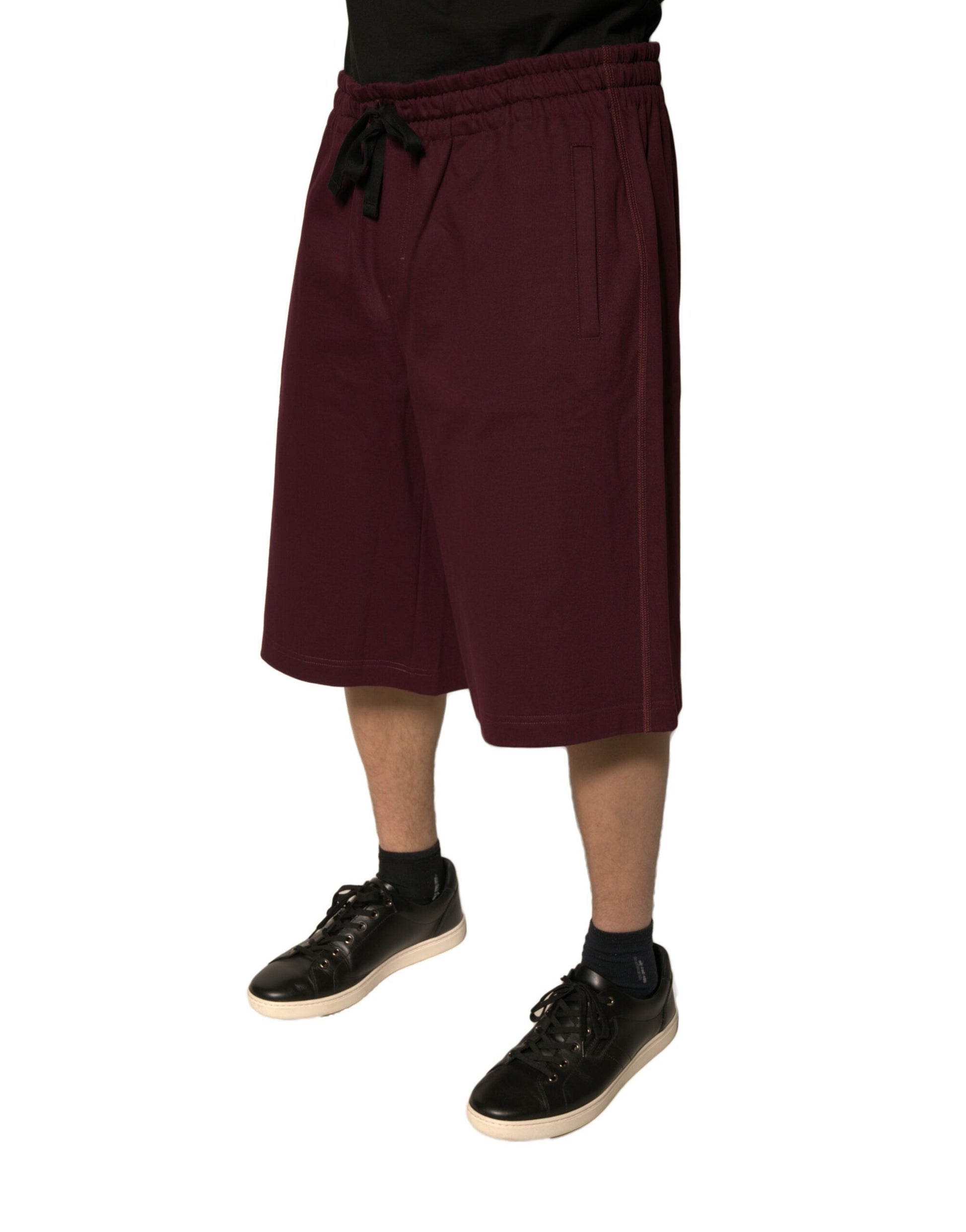 A pair of maroon cotton mid waist bermuda shorts
