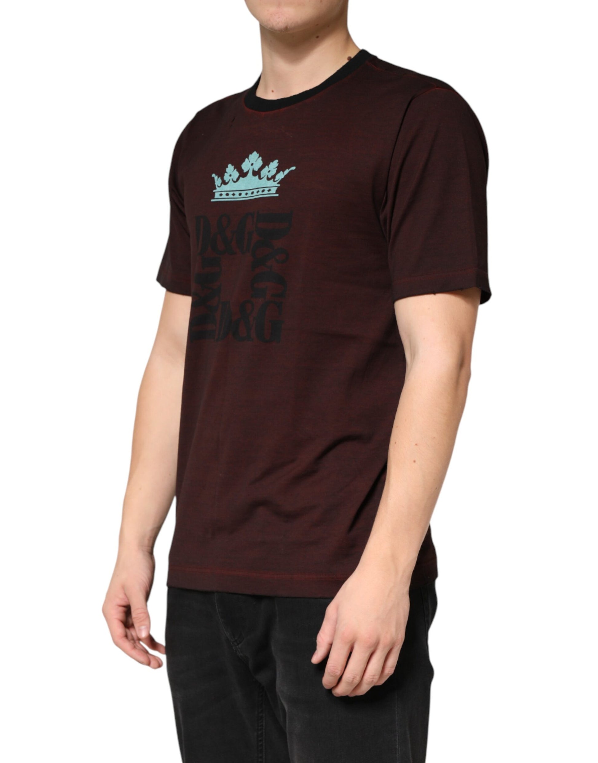 Man wearing a maroon t-shirt with white lettering and graphic on front