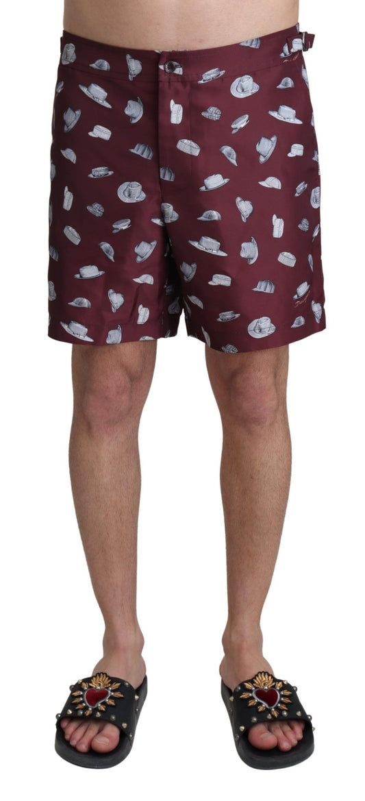 Man wearing swim trunks and sandals