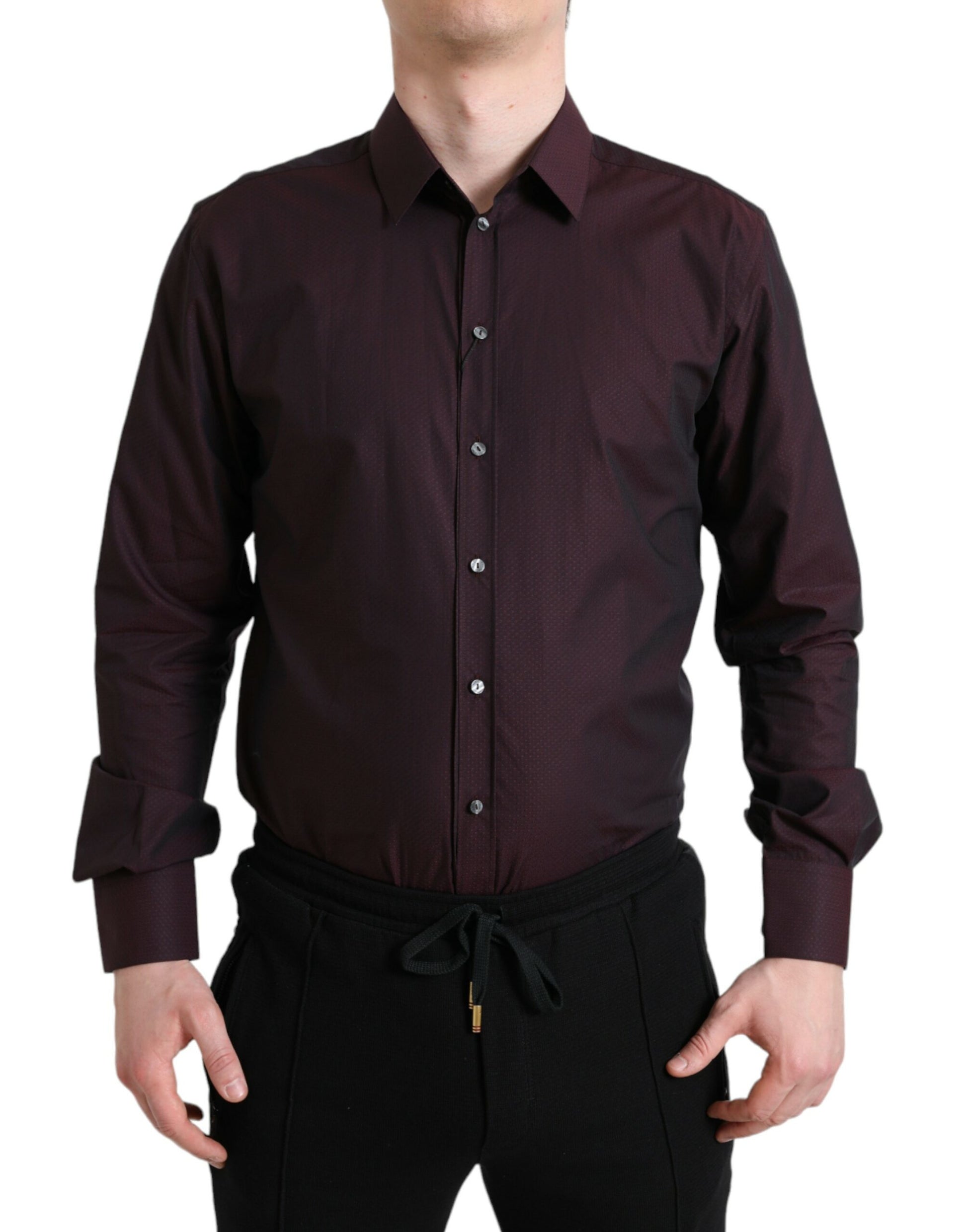 Man wearing a dark shirt and black pants