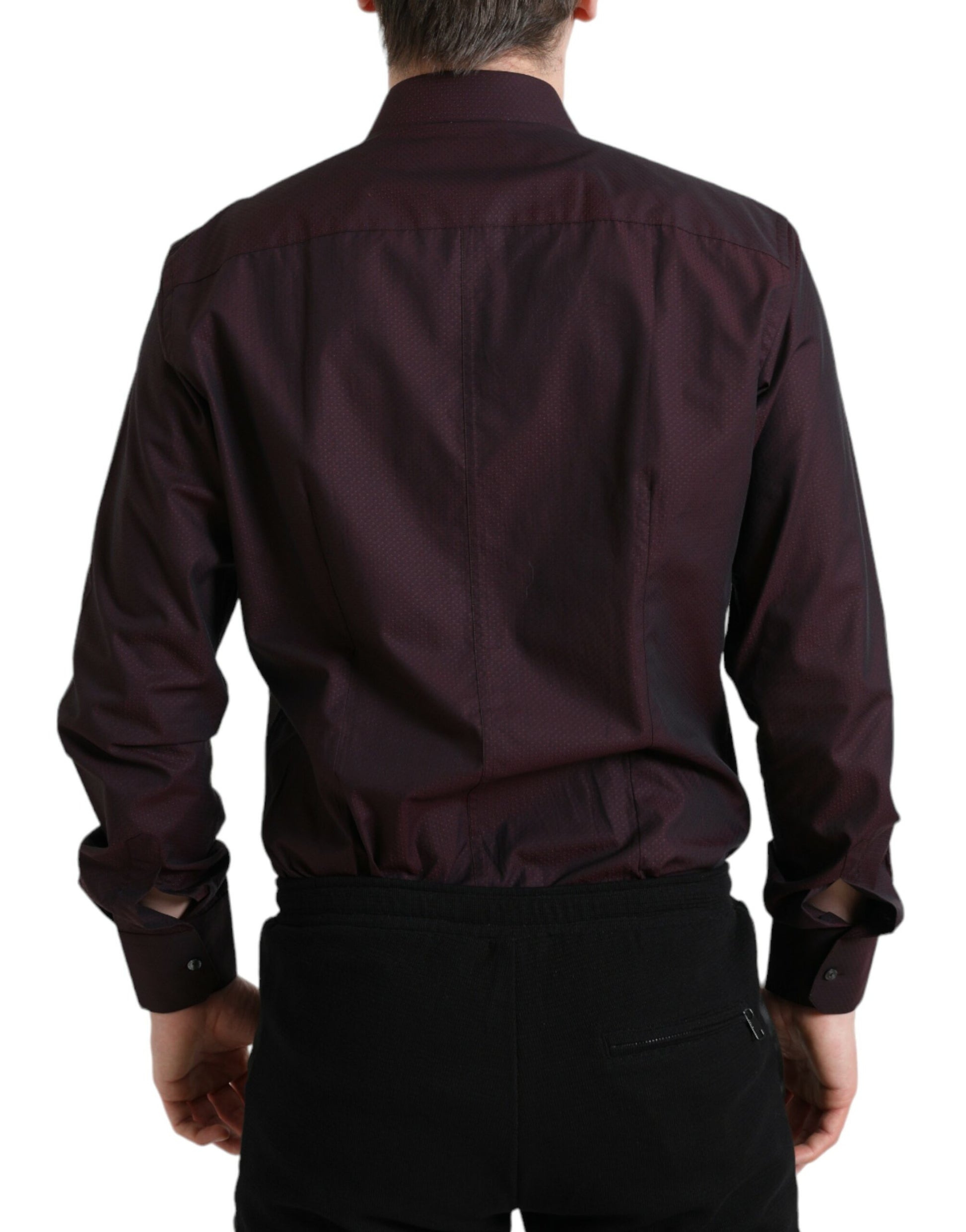 Man wearing dark shirt and black pants