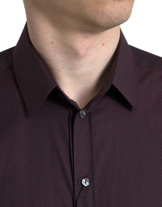 Man wearing a dark shirt with collar