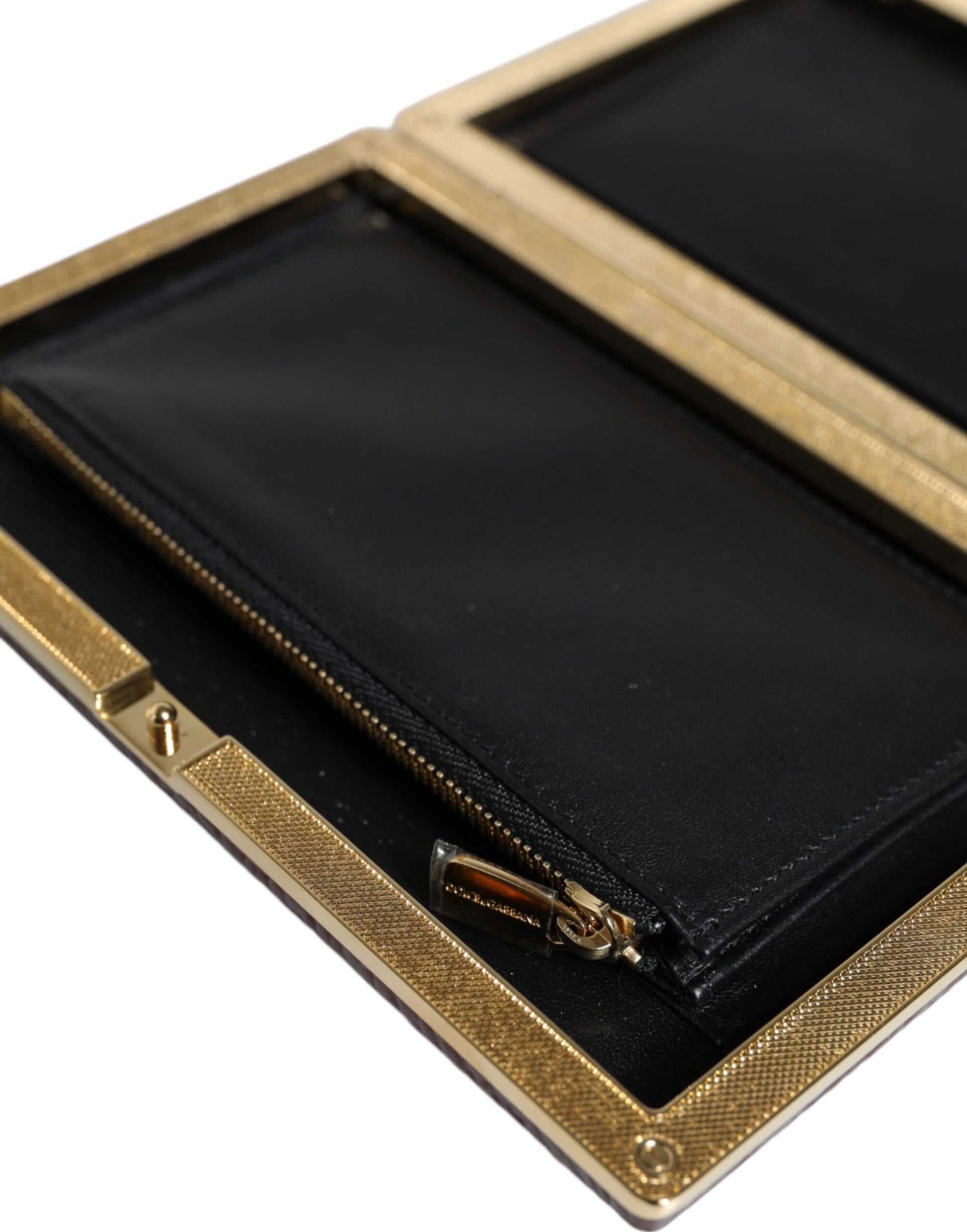 Black leather wallet with gold trim