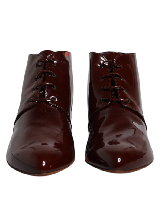 Pair of brown leather boots with laces