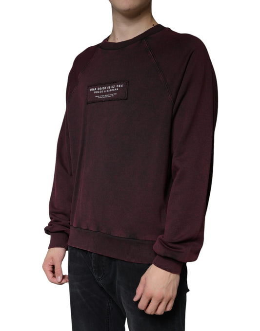 Long sleeve maroon sweatshirt with white lettering on front