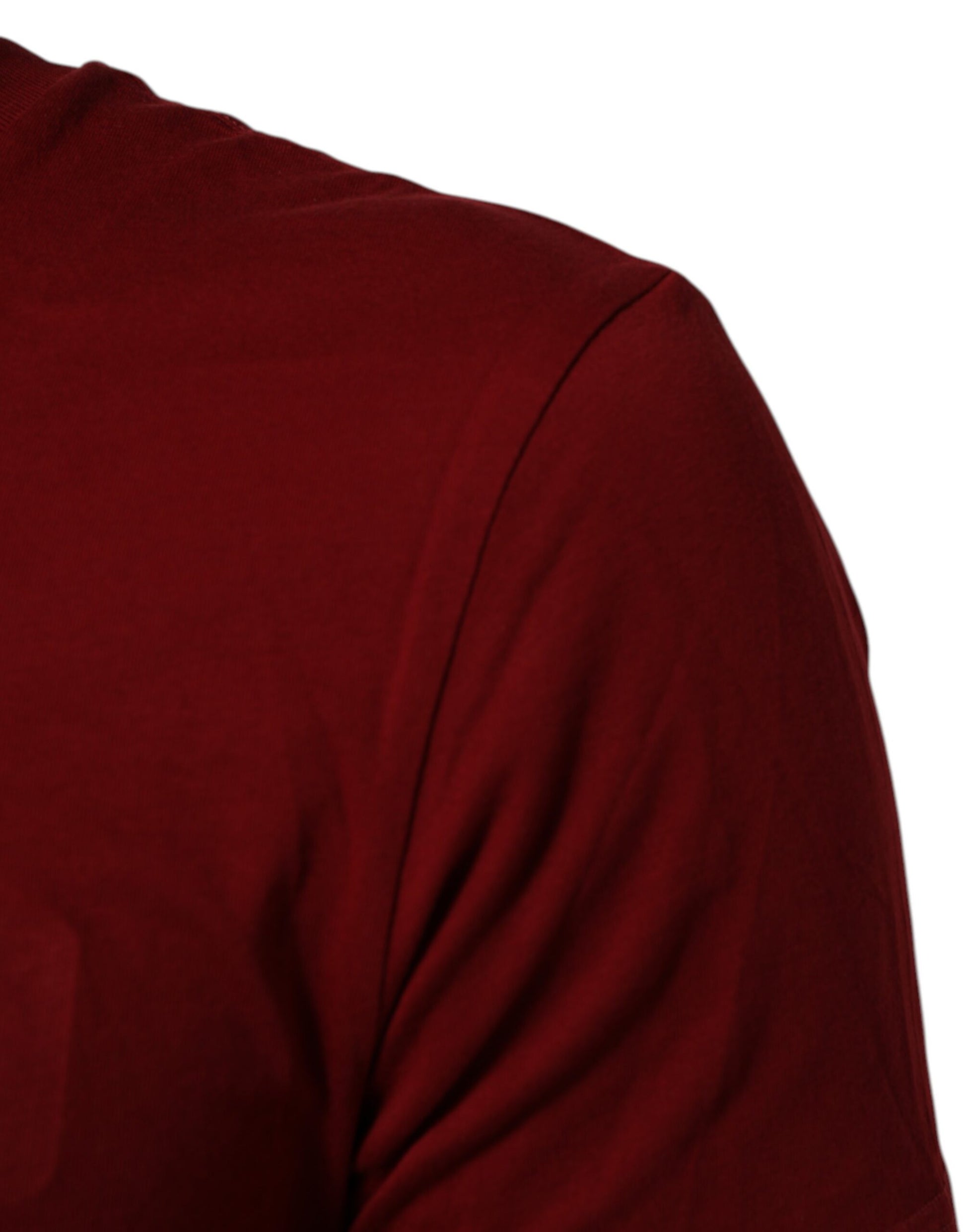 Short sleeved red shirt on a person's shoulder