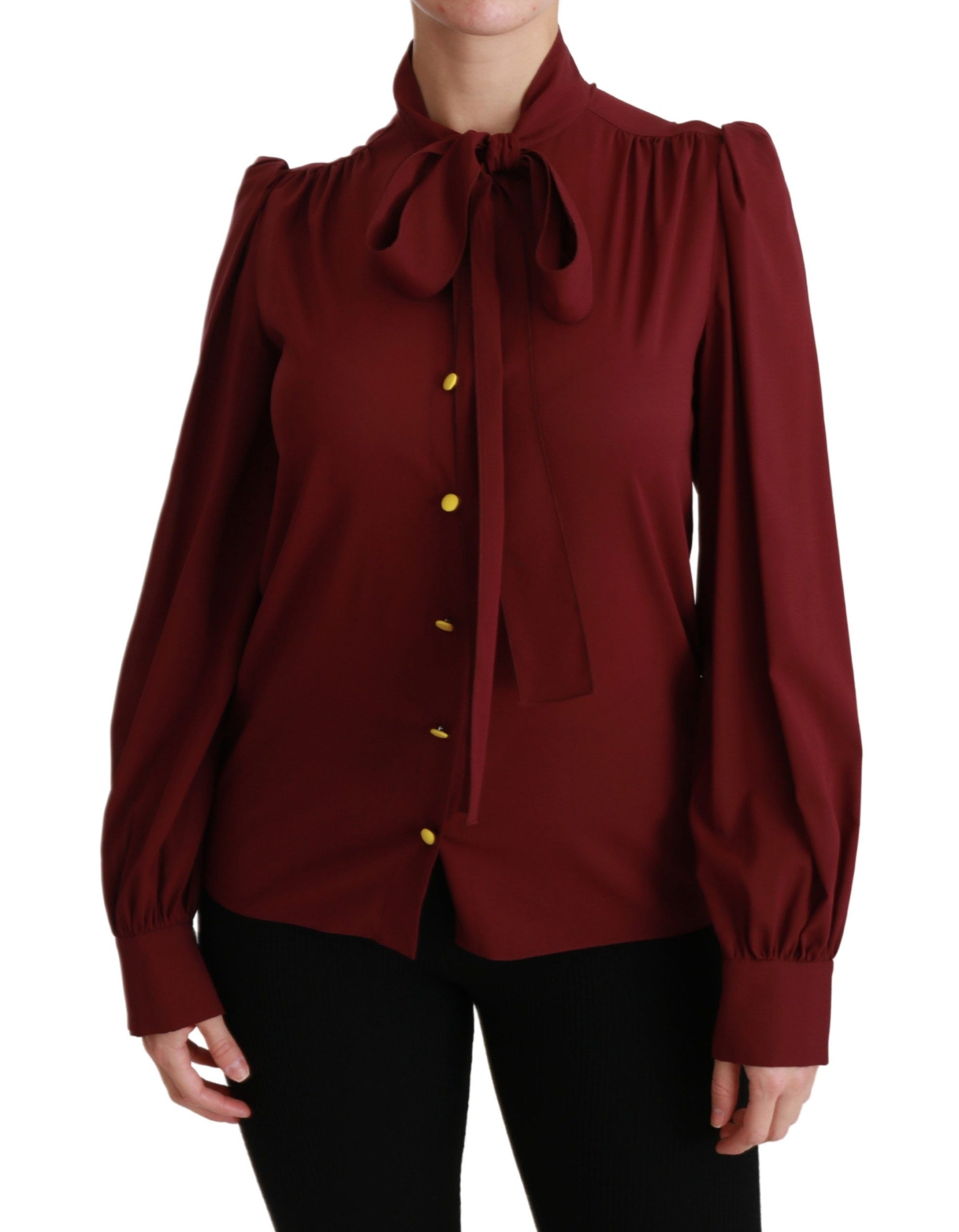 Woman wearing red shirt with ruffled sleeves
