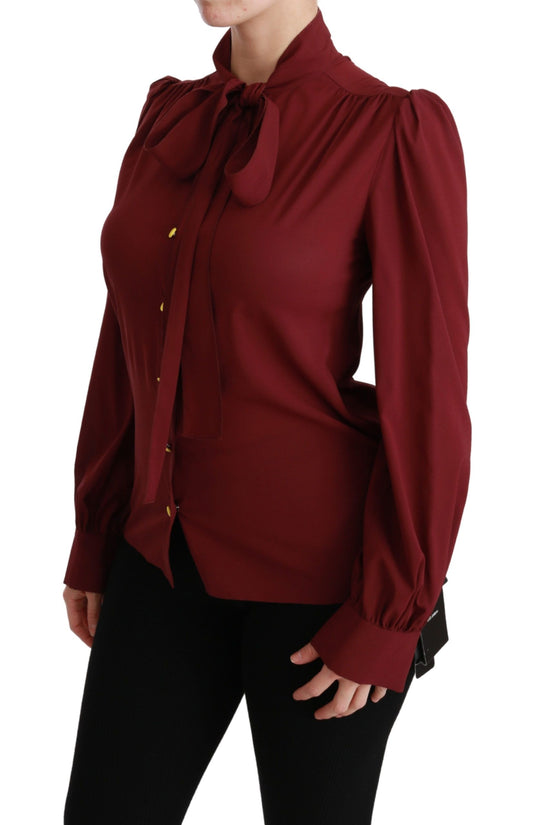 Woman wearing red shirt with ruffles on sleeves