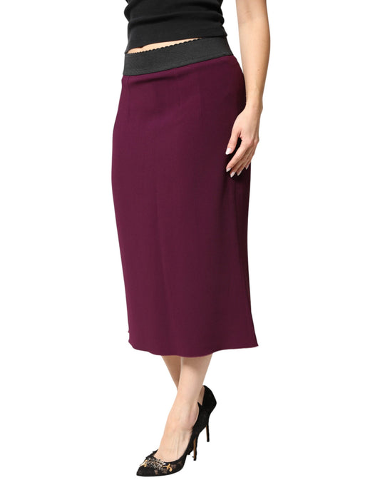 Woman wearing a maroon skirt and black top