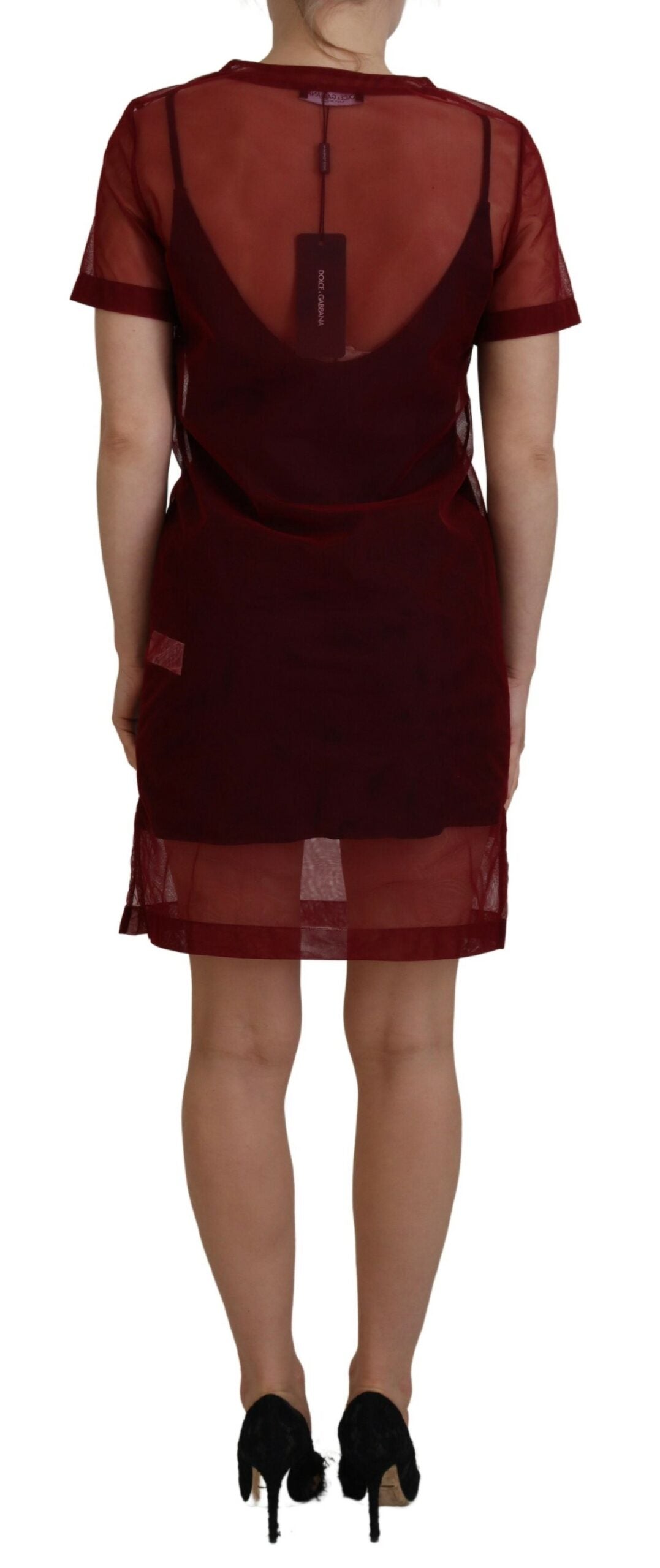 A maroon nylon two layer shift mini dress with a high neckline and short sleeves