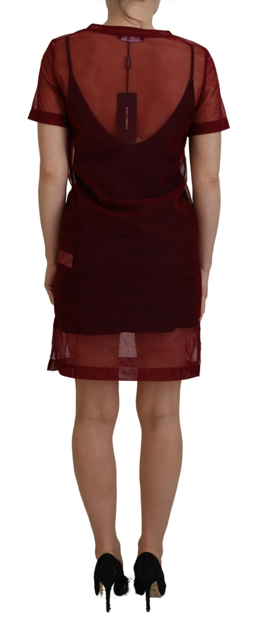 A maroon nylon two layer shift mini dress with a high neckline and short sleeves