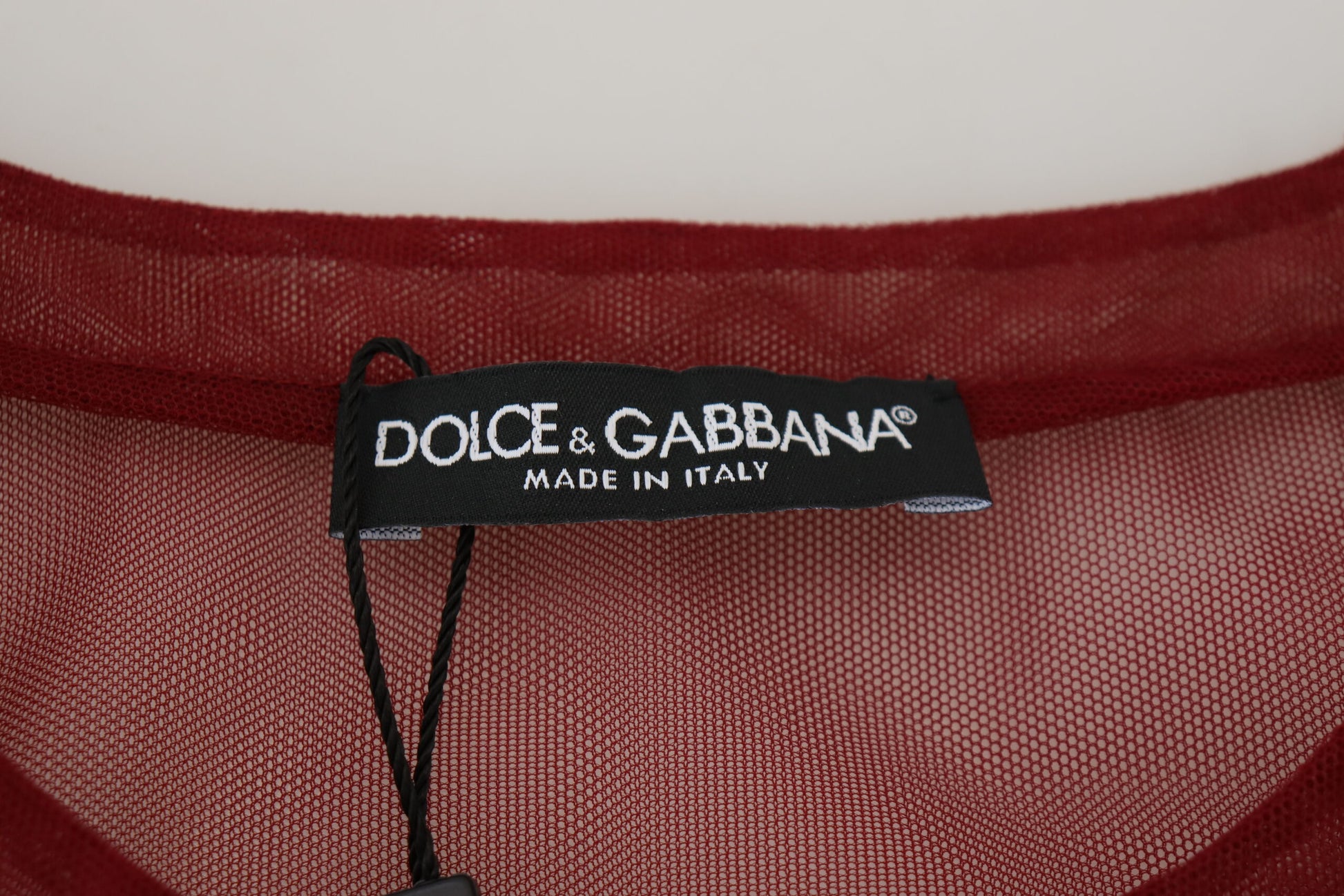Red nylon dress with black tag