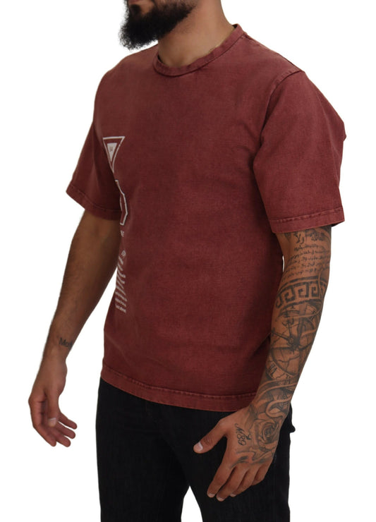 Man wearing red t-shirt with white graphic on front
