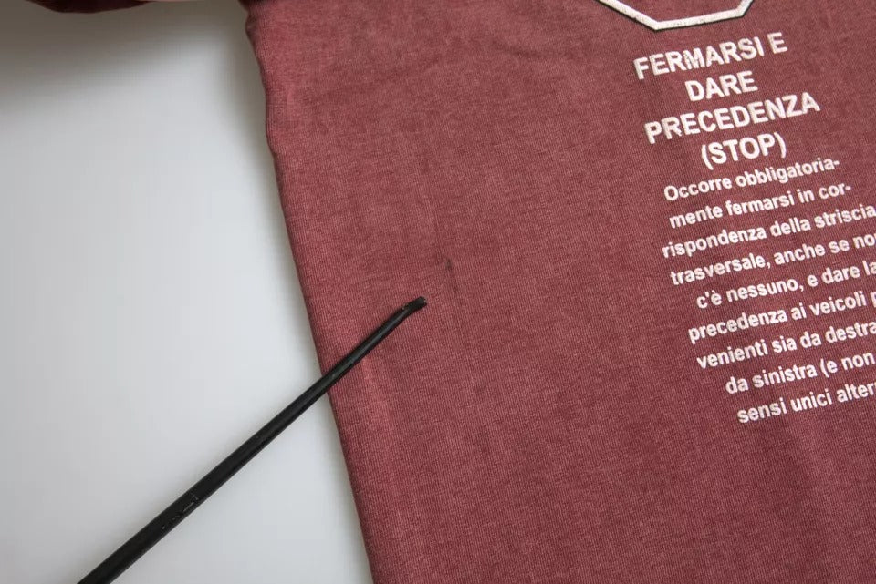 Red t-shirt with white lettering