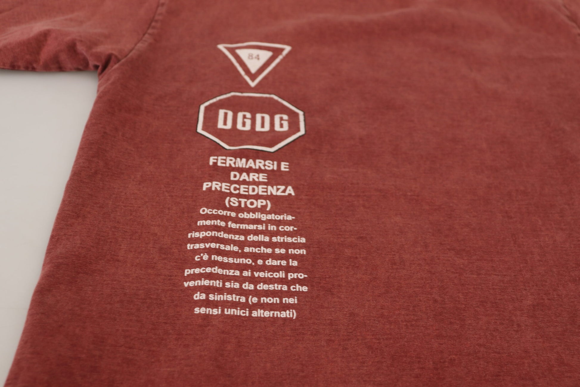 Red shirt with white lettering