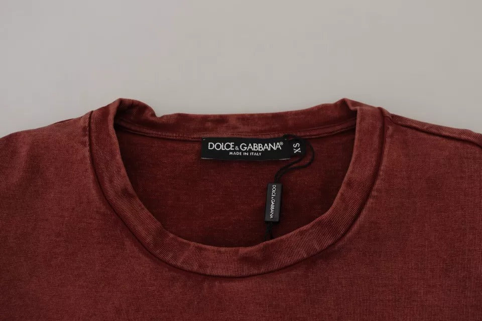 Red long sleeve shirt on hanger