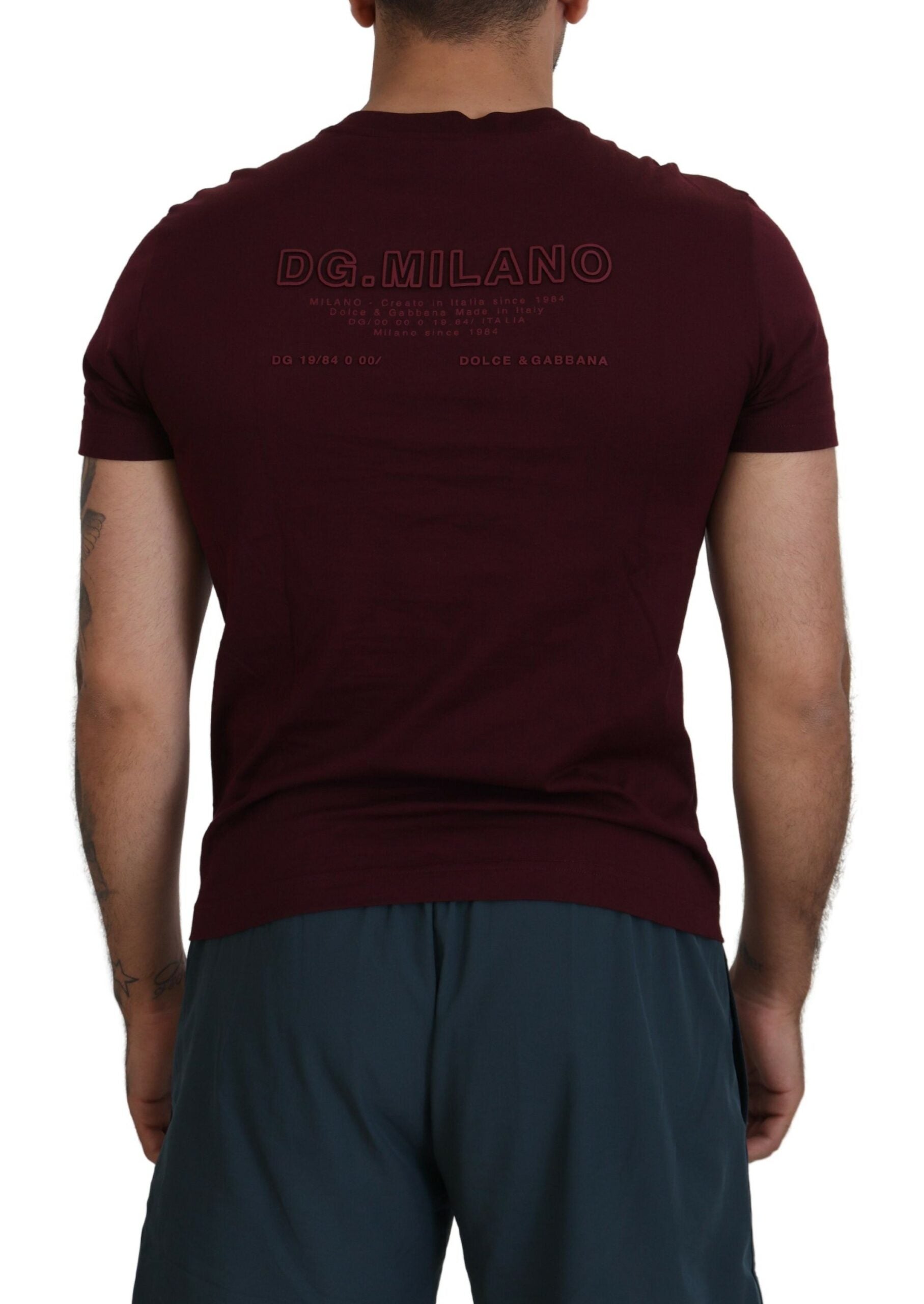 Maroon t-shirt with white lettering on back