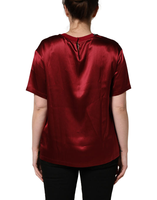 Red velvet shirt on a woman's back