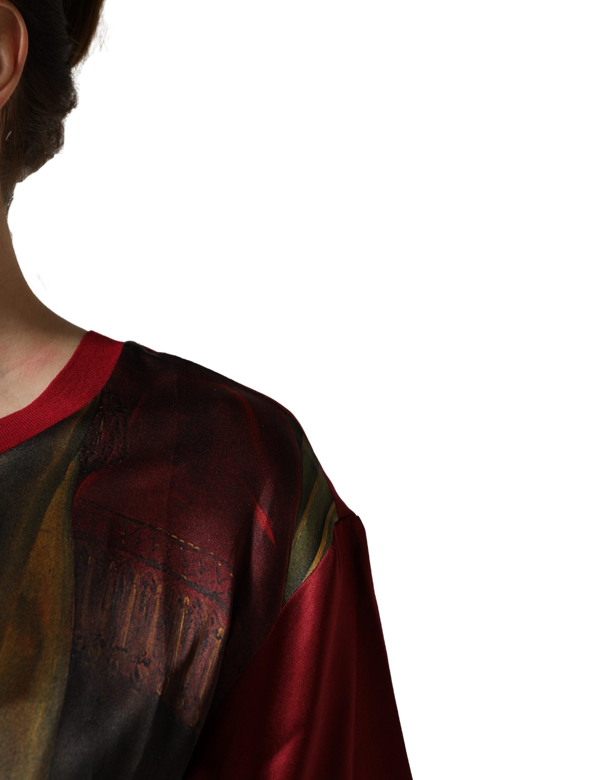 The person is wearing a colorful shirt