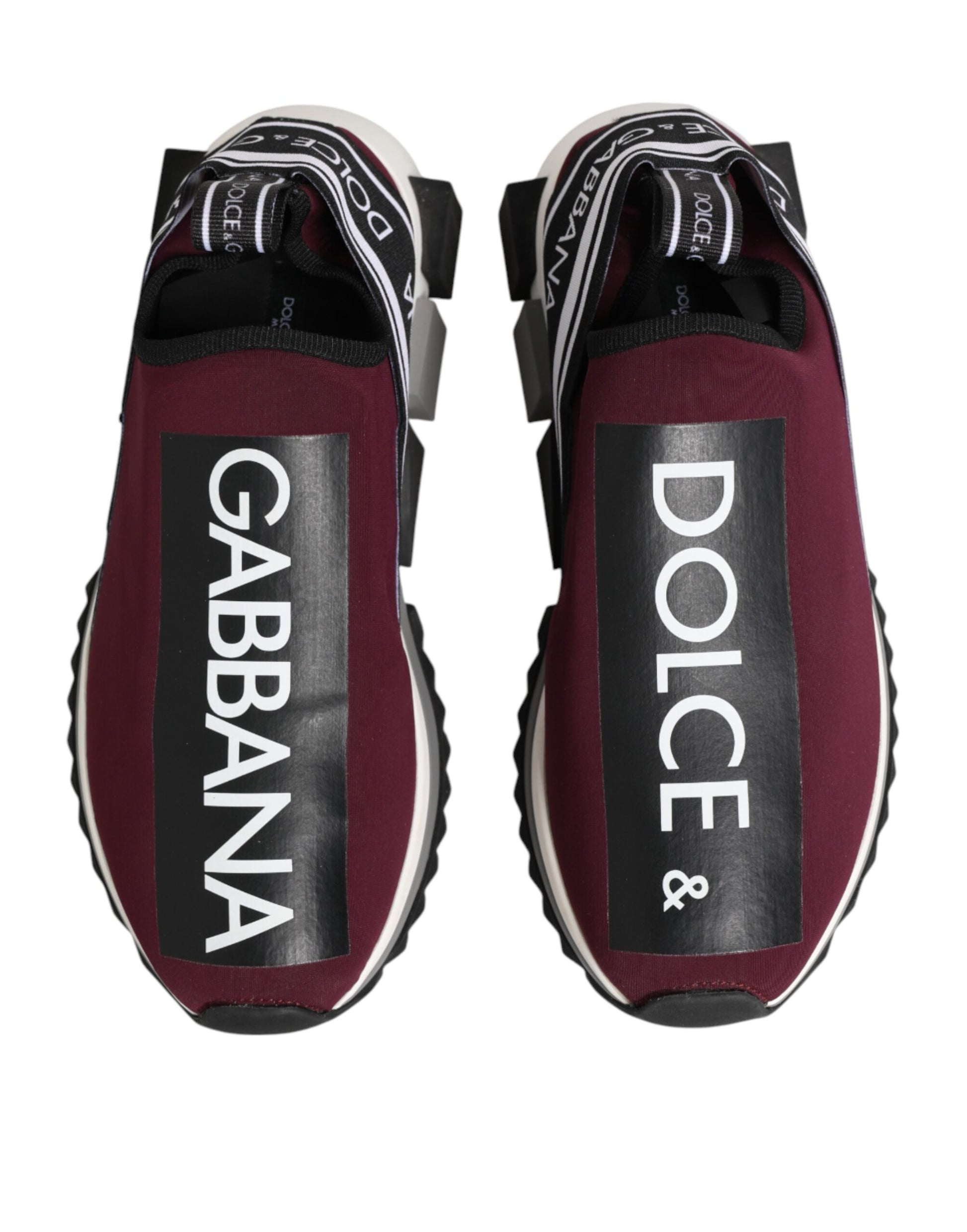 Pair of sneakers with brand names on side