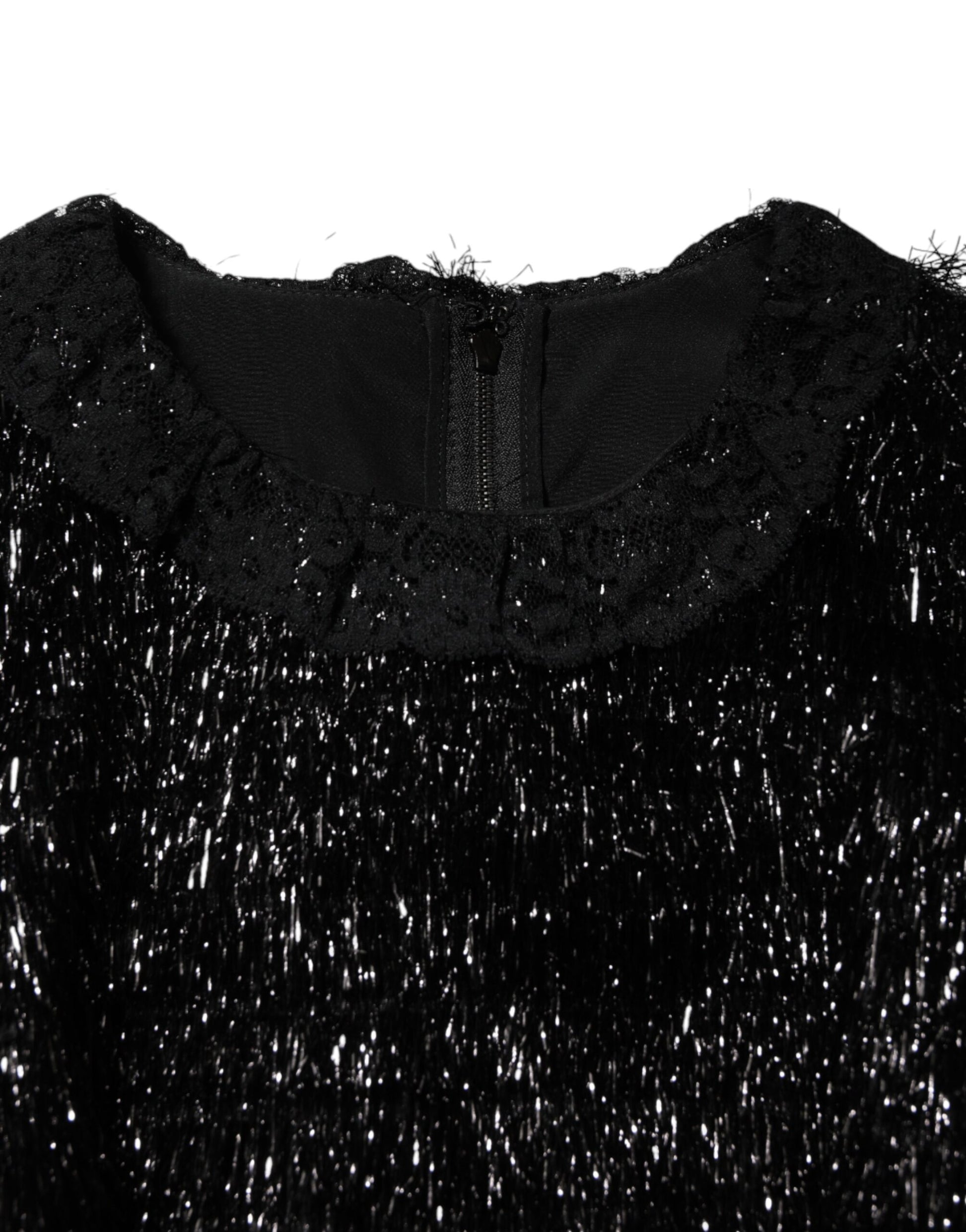 A black dress with metallic sparkles, featuring an A-line silhouette and midi length. It is made of polyester