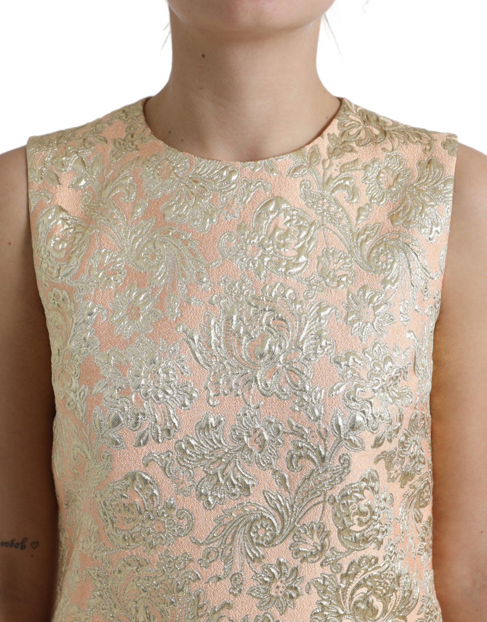 Gold sequined floral mini dress with embellished bodice and sleeves