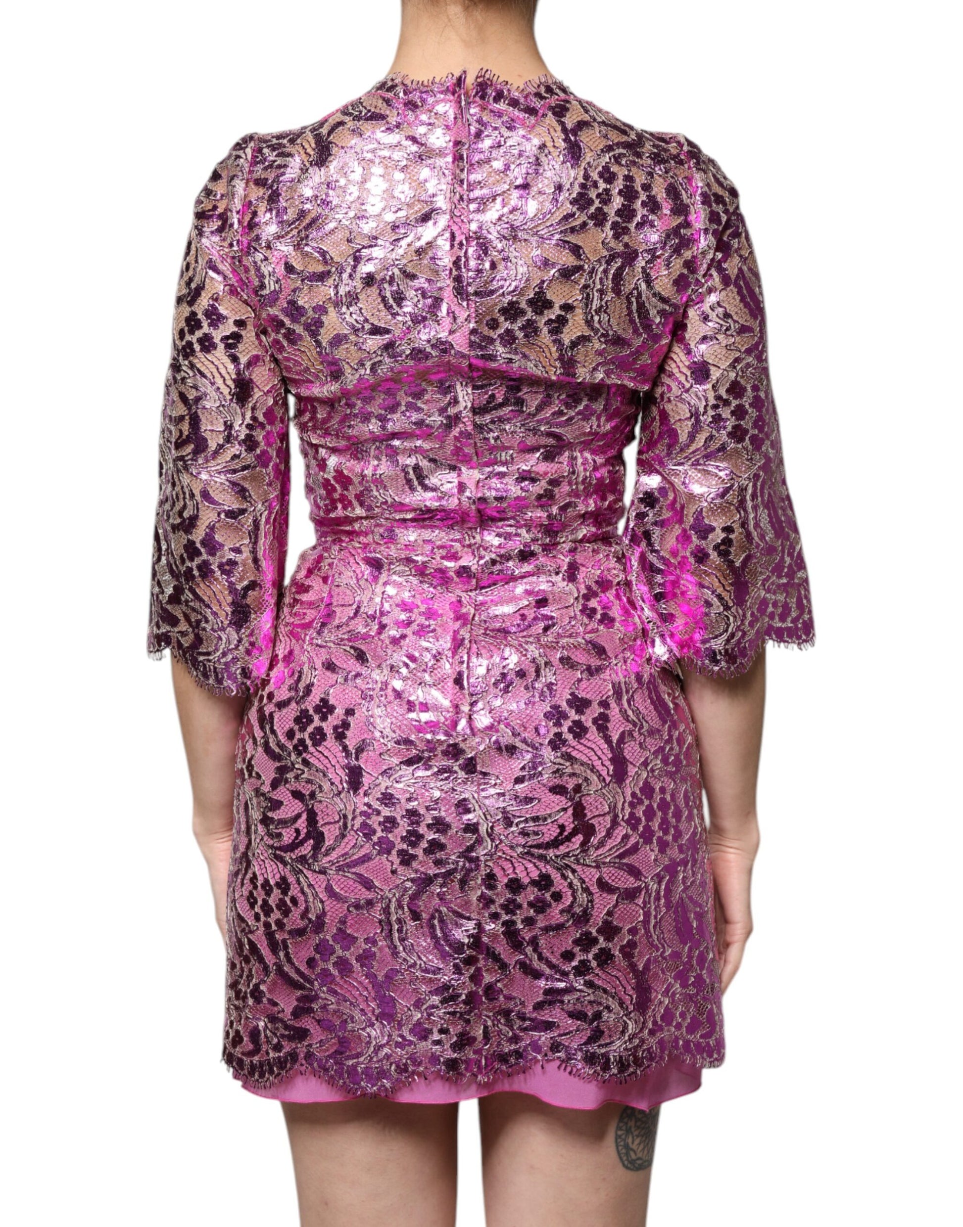 Pink floral sheath dress with metallic accents, short sleeves and a fitted waist