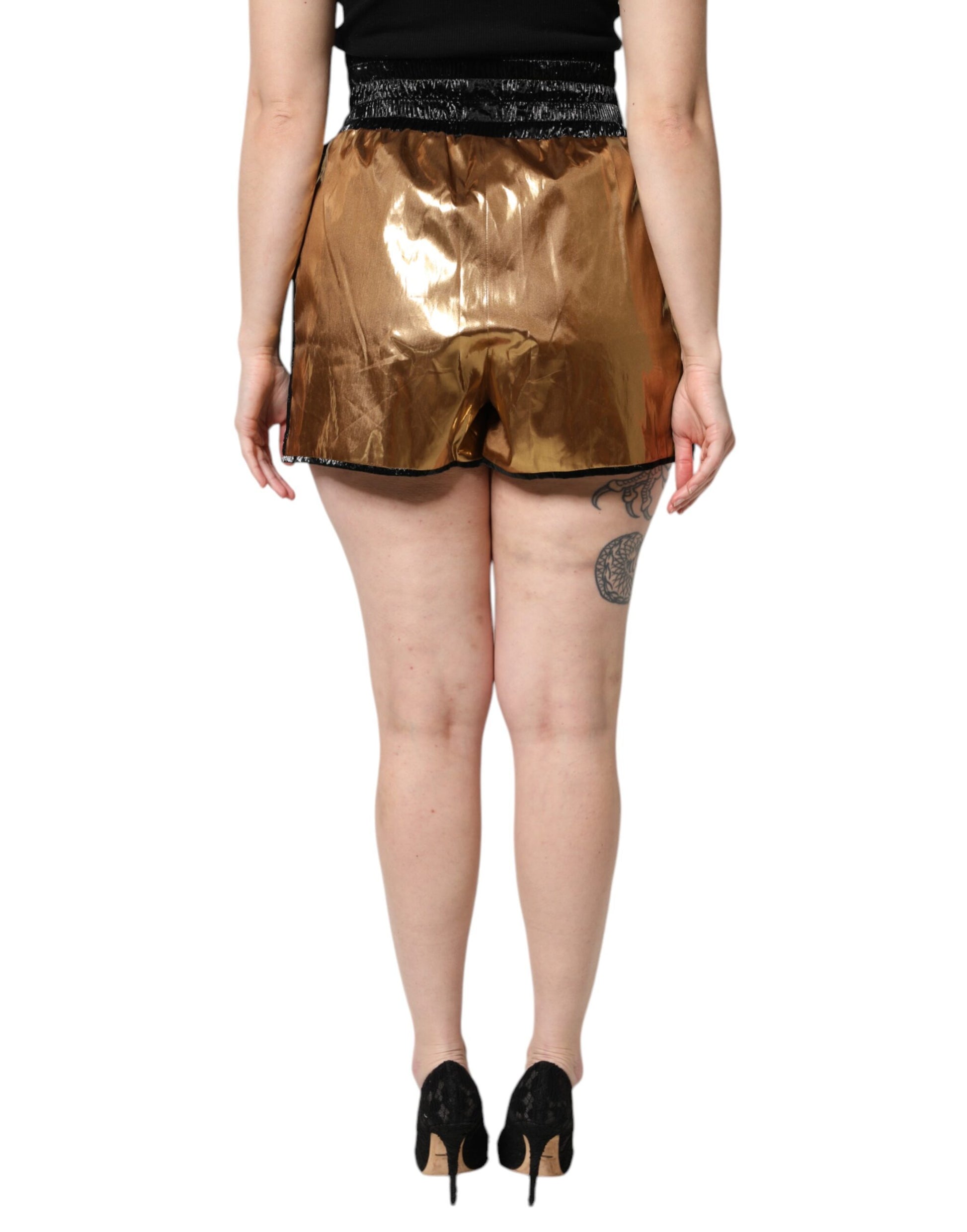 Gold sequin shorts with high waist and ruffle hem