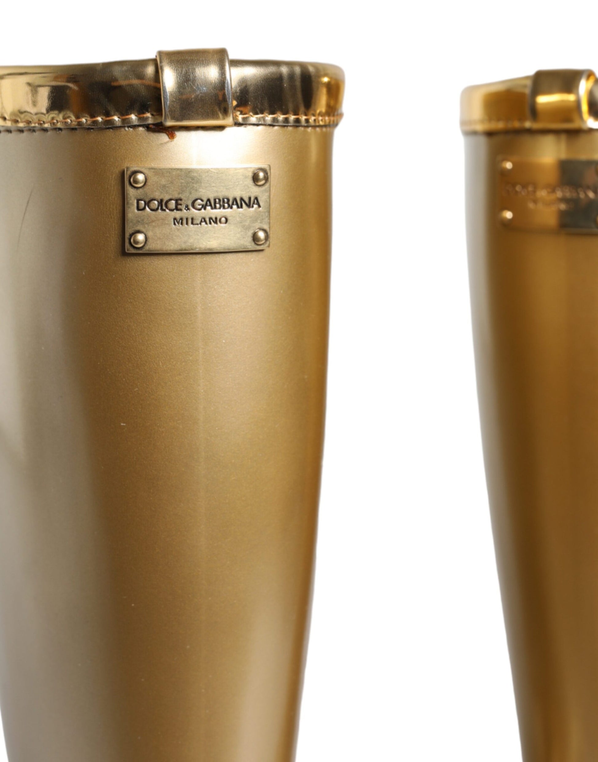 Gold cup with brand name on side